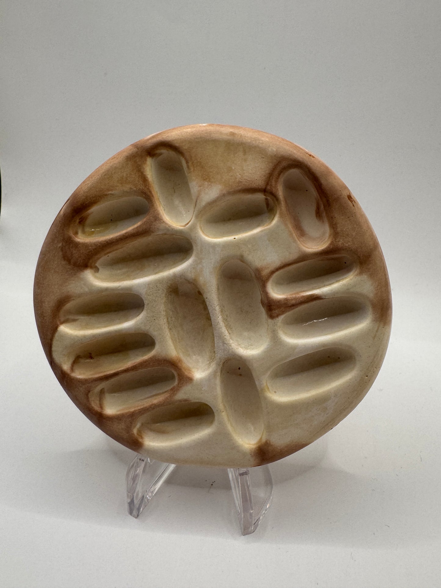 White and brown coaster
