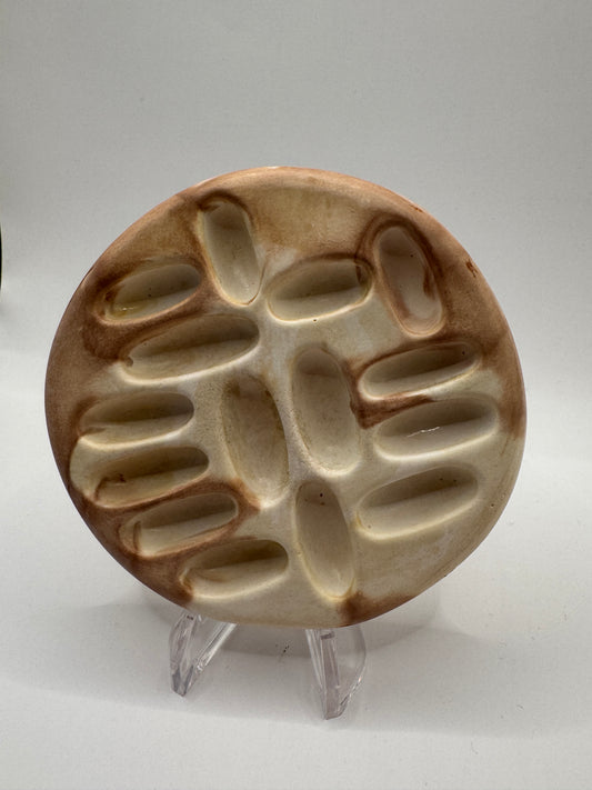 White and brown coaster